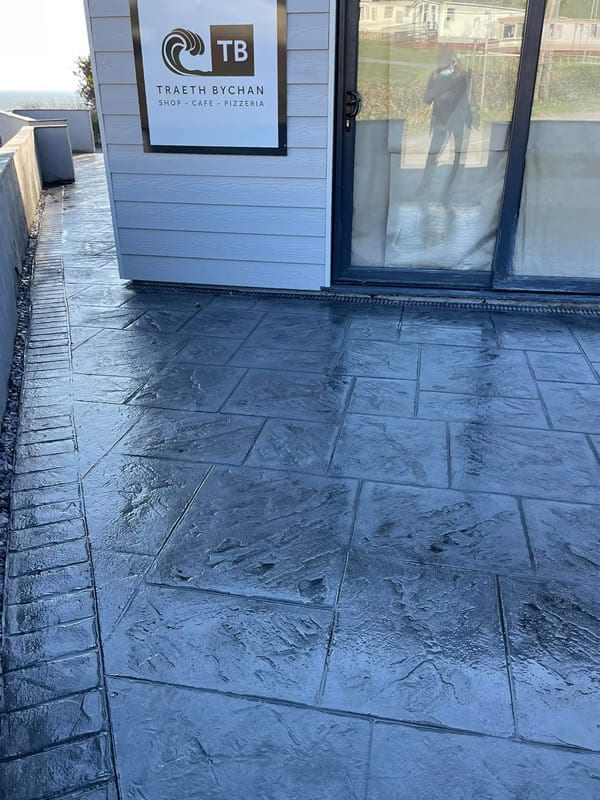 grand ashlar imprinted concrete anglesey beach shop